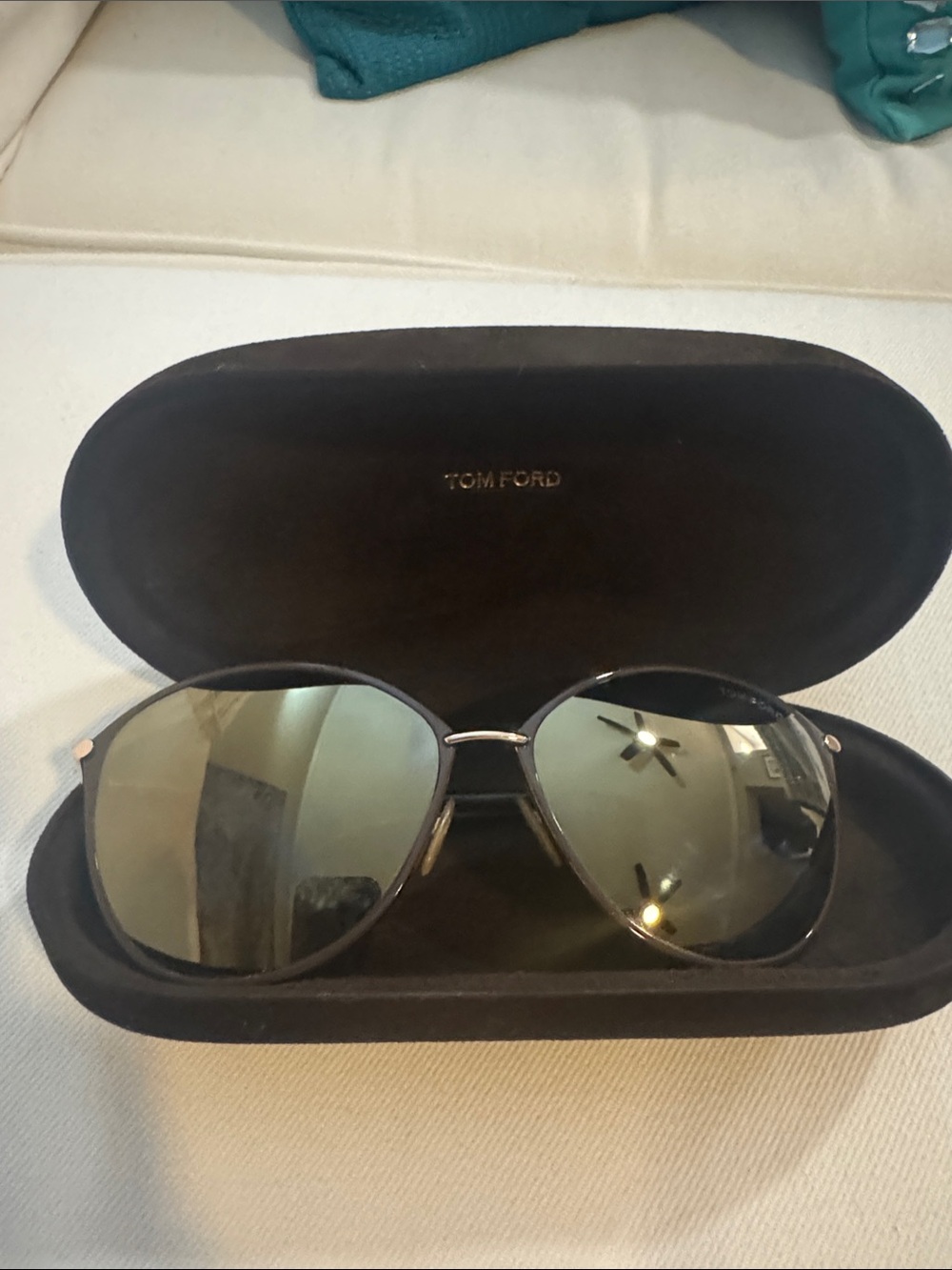 Tom Ford Black Frame Sunglasses with Green-Tinted Lenses